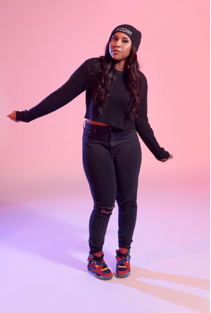 Woman in studio mid-dance