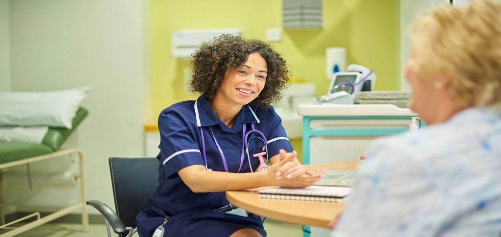 Two women in health care setting