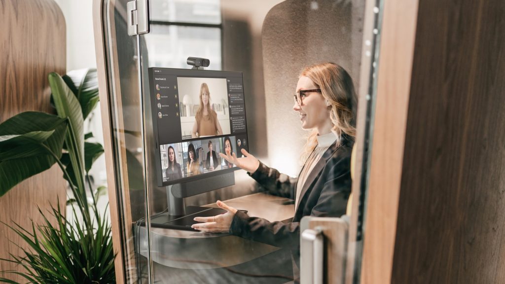 Woman in a mini-office conducting a video meeting