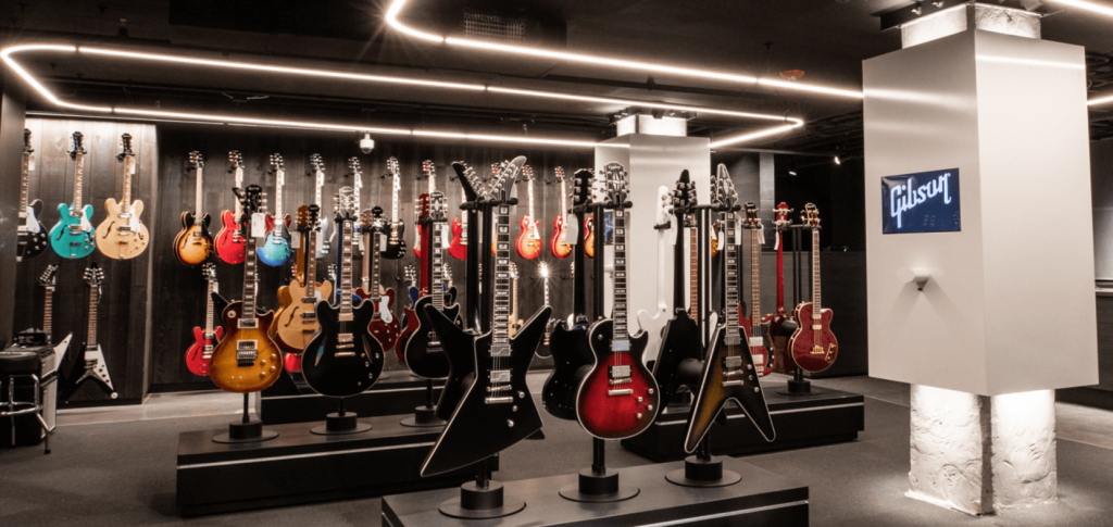 Many Gibson guitars on display