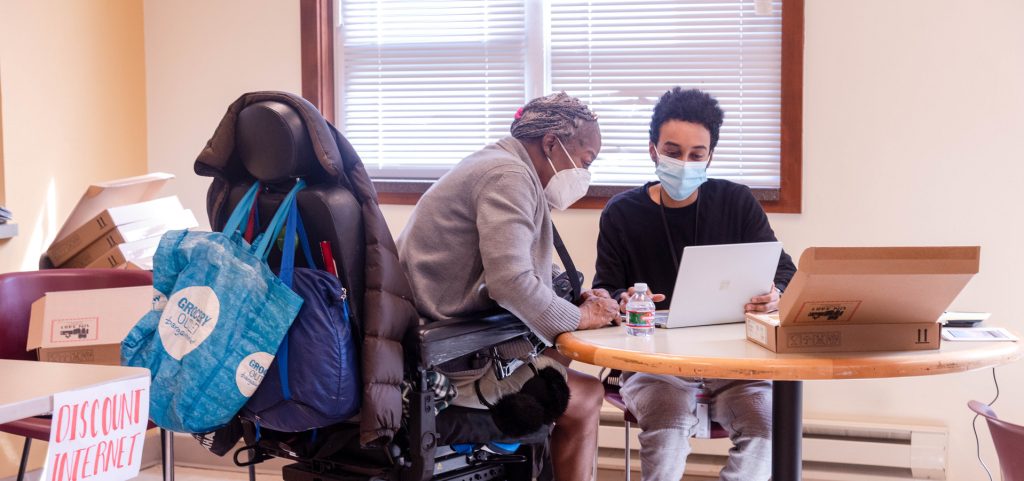 Woman being helped by Seattle Housing Authority