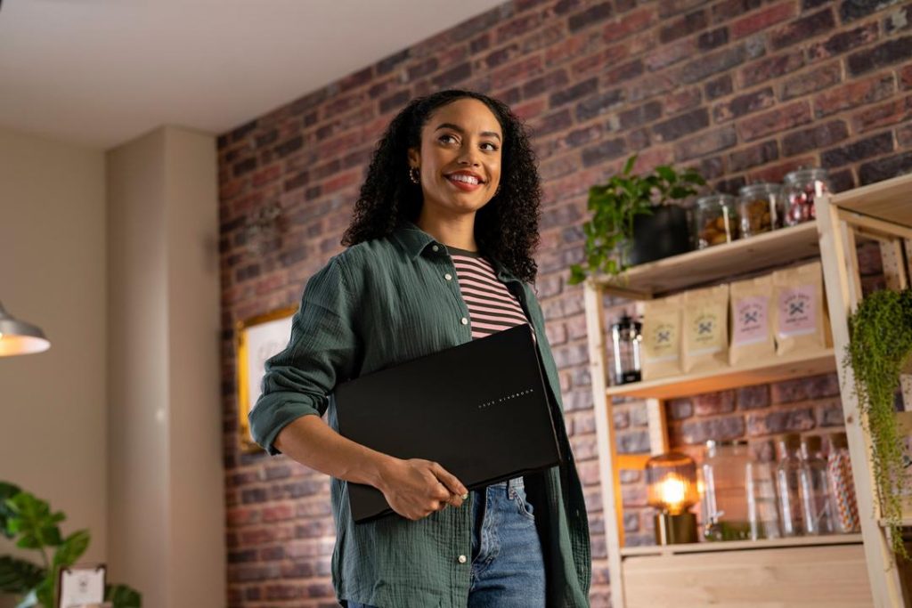 Young woman holding a tablet device