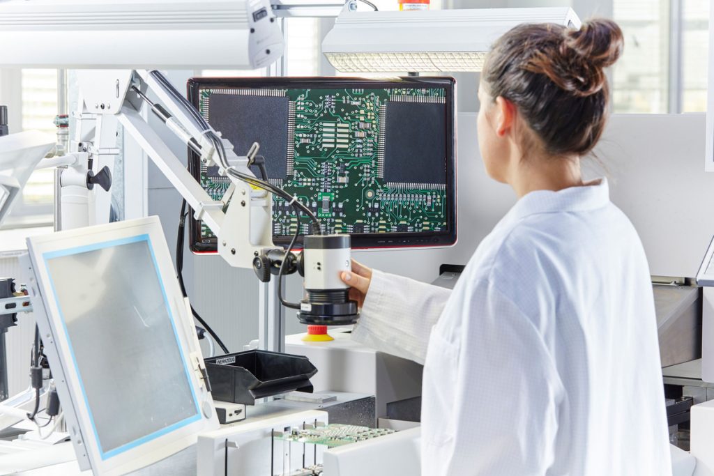 Woman in lab using computer